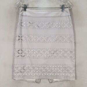 White House Black Market Cream Pencil Skirt w/ Cut Out Details. Size 2 NWT